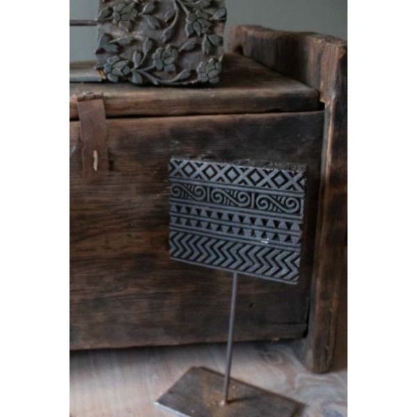 Batik stempel op voet